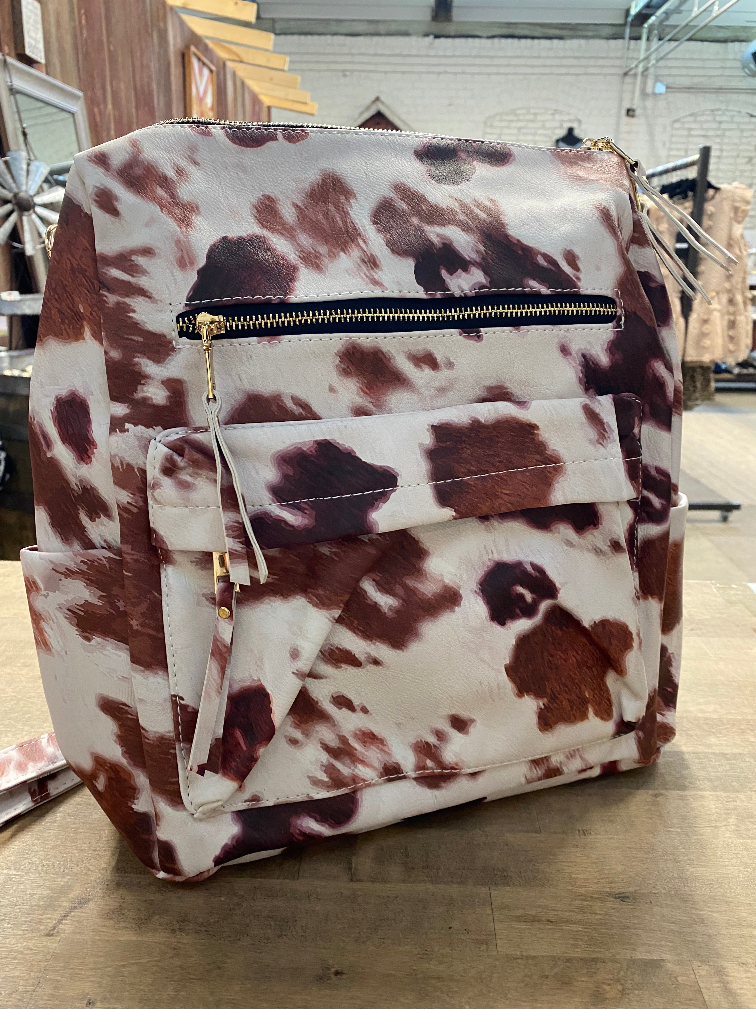 Brown Cow Print Faux Leather Backpack